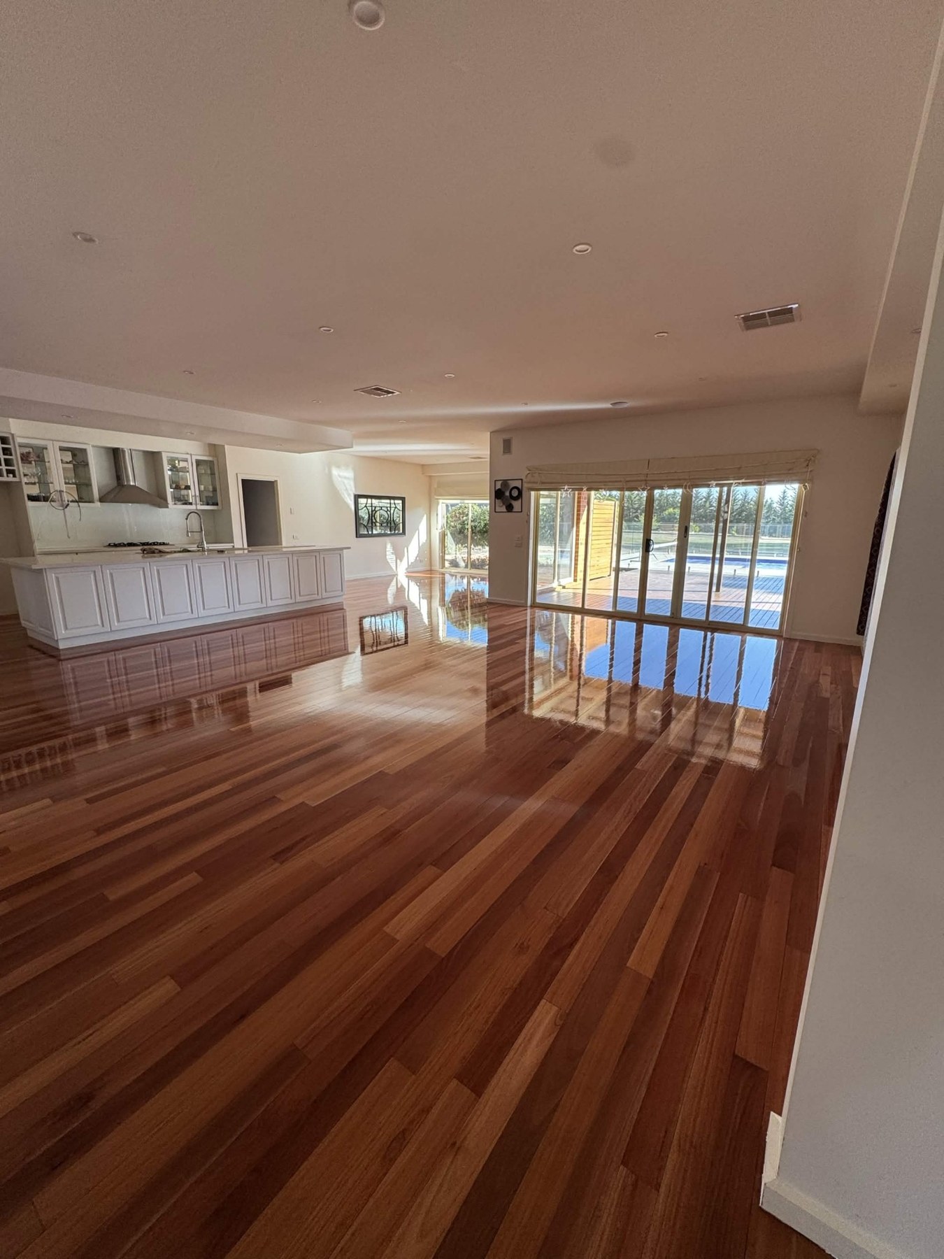 Large polished timber floor in an open family room